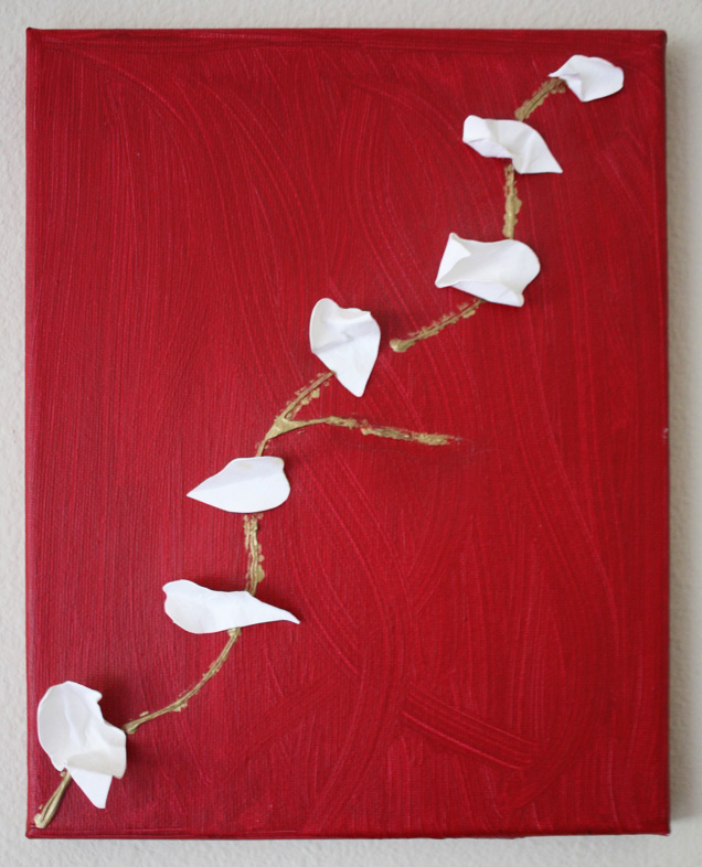 Molly’s elegant red painting with white sculpted petals arranged along a painted vine.